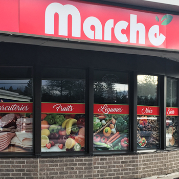 Imprimé grand format appliqué sur le mur du Marché Richard